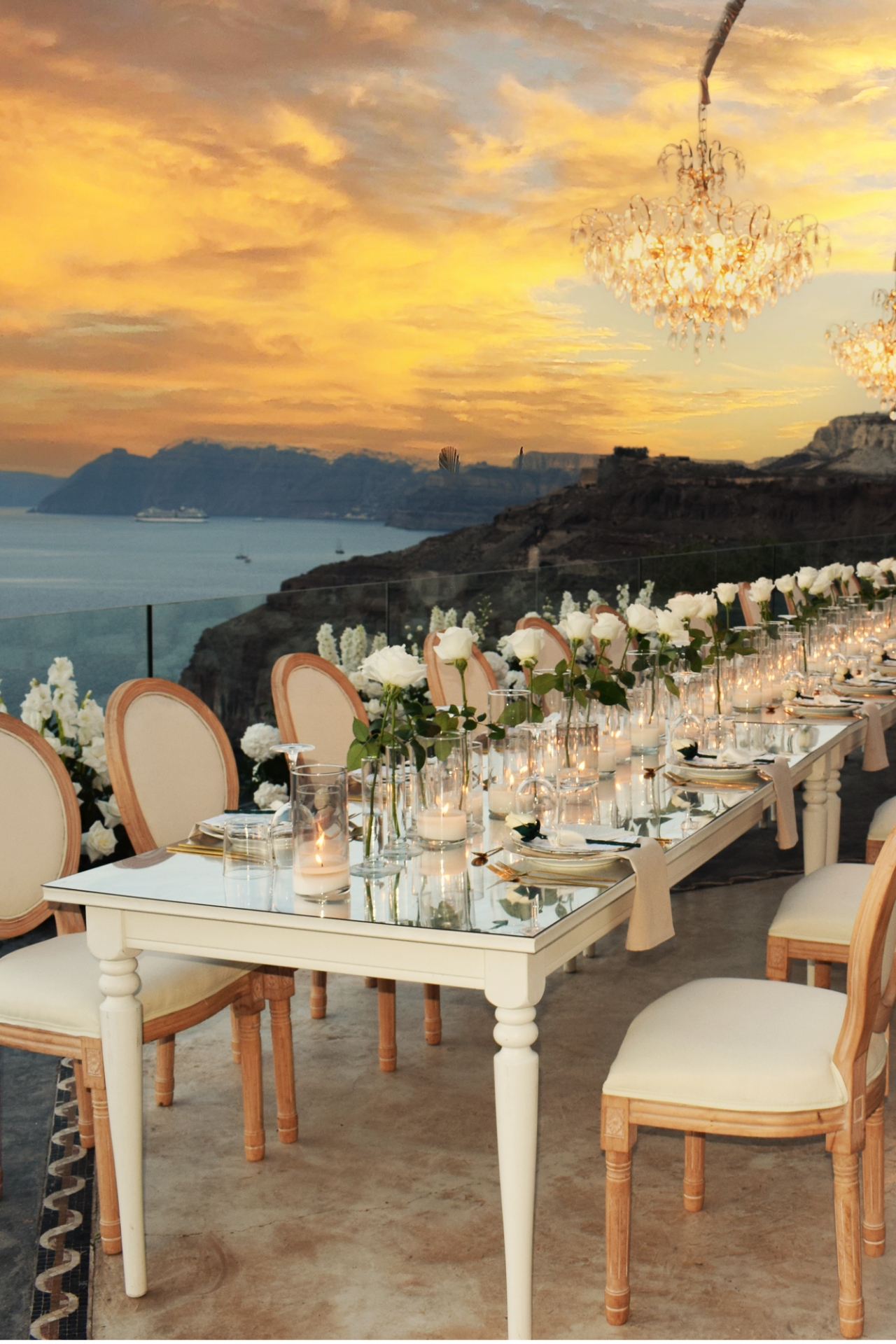 Luxury buffet catering in Santorini with elegant dinner setup overlooking the caldera